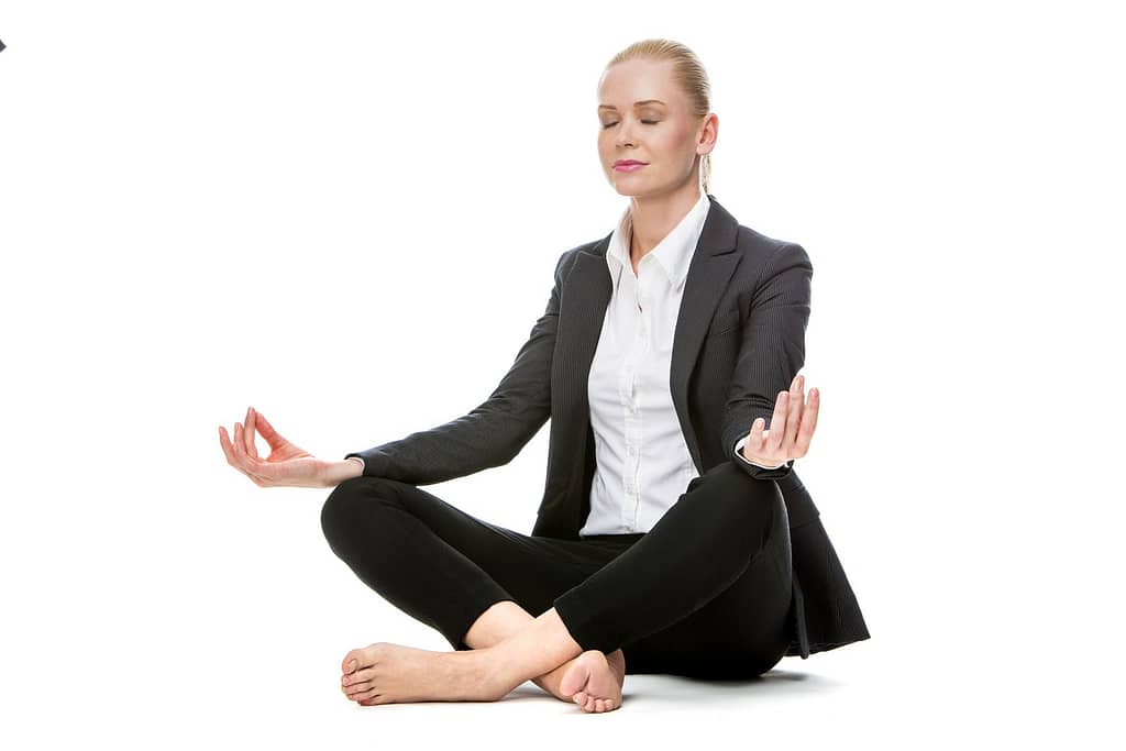 businesswoman doing yoga office yoga